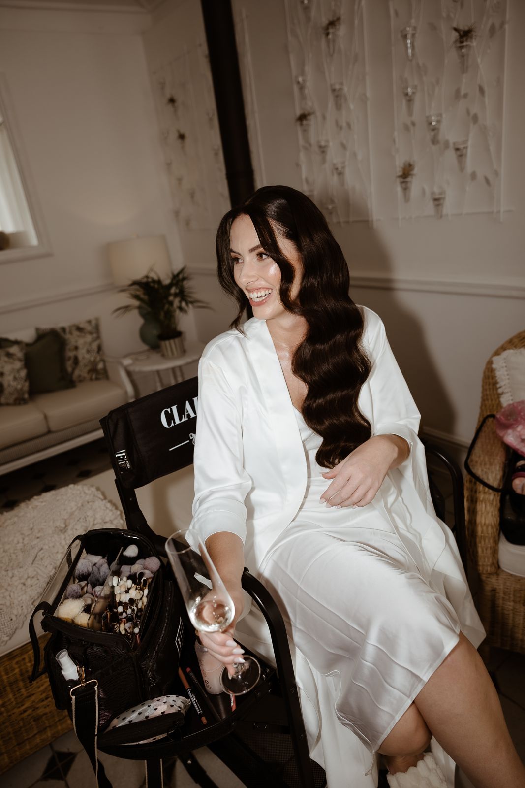 Bride getting ready in a white robe