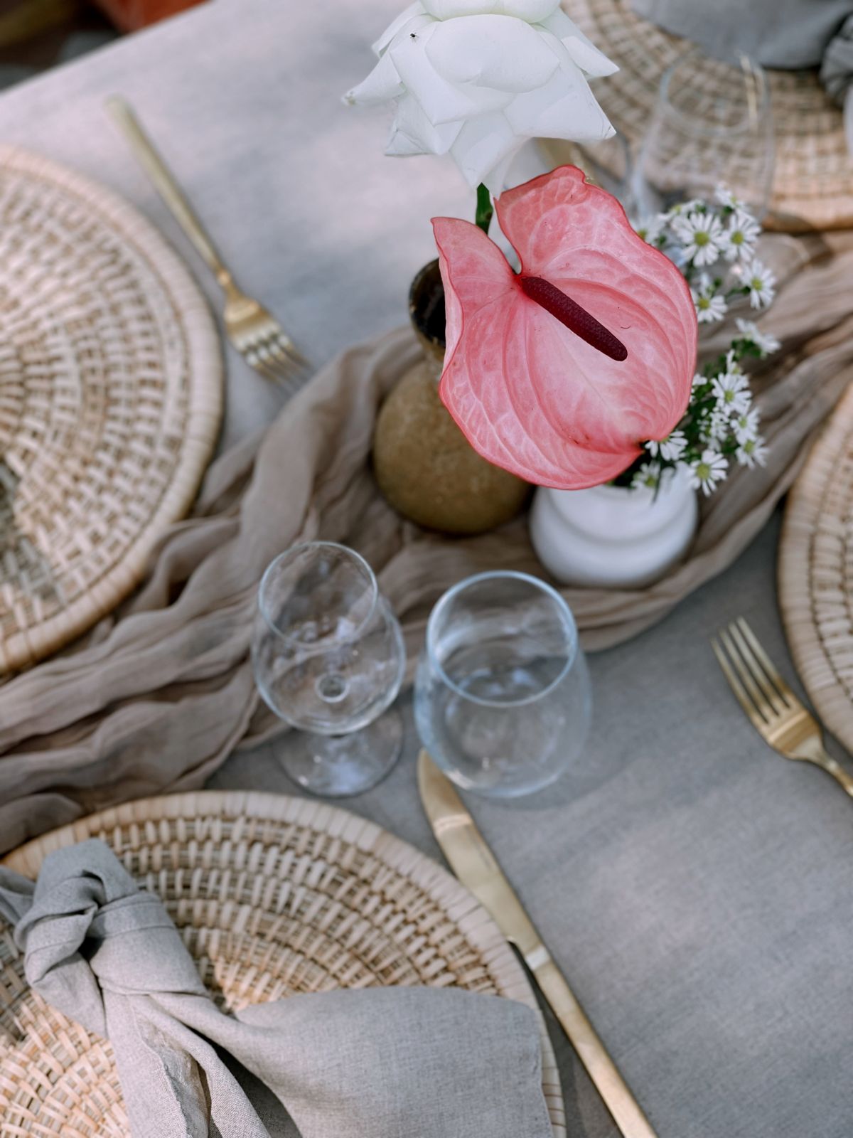 Picnic place setting with a pink anthurium