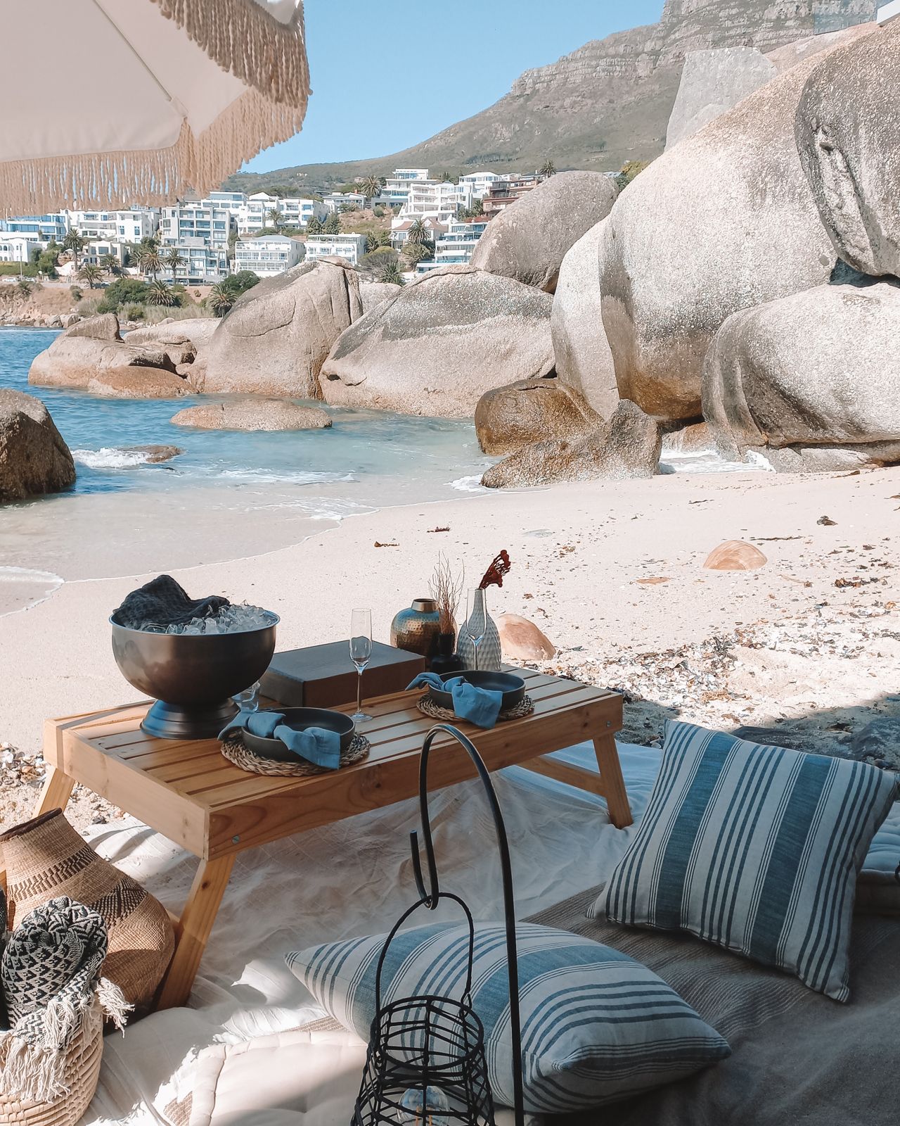 Beach picnic among the granite boulders