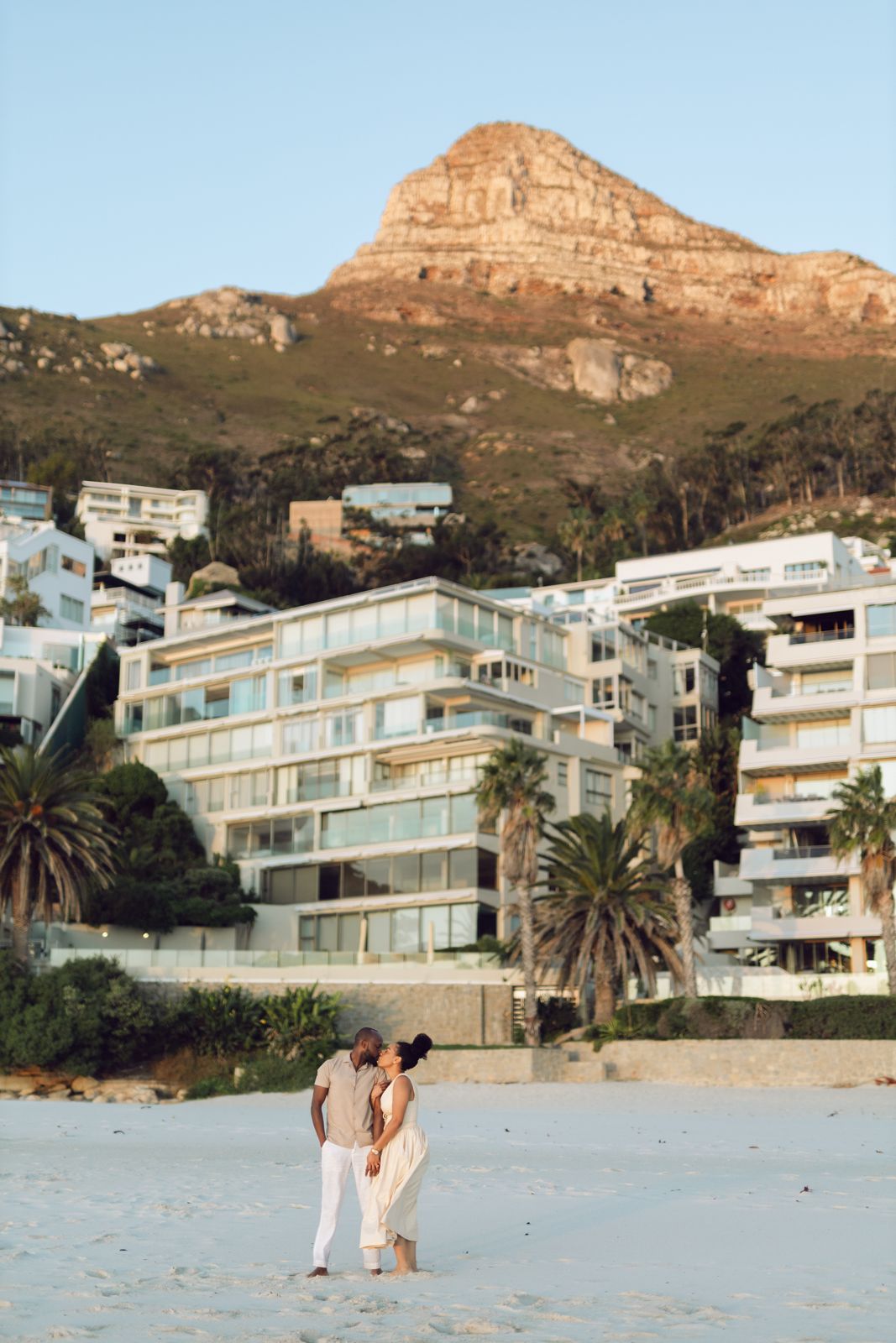 Couple on the beach below Lion’s Head